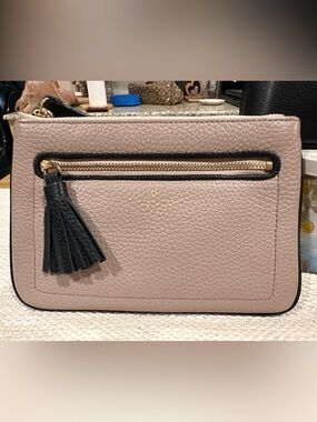 kate spade Pebbled Taupe Leather Wristlet with Black Tassel